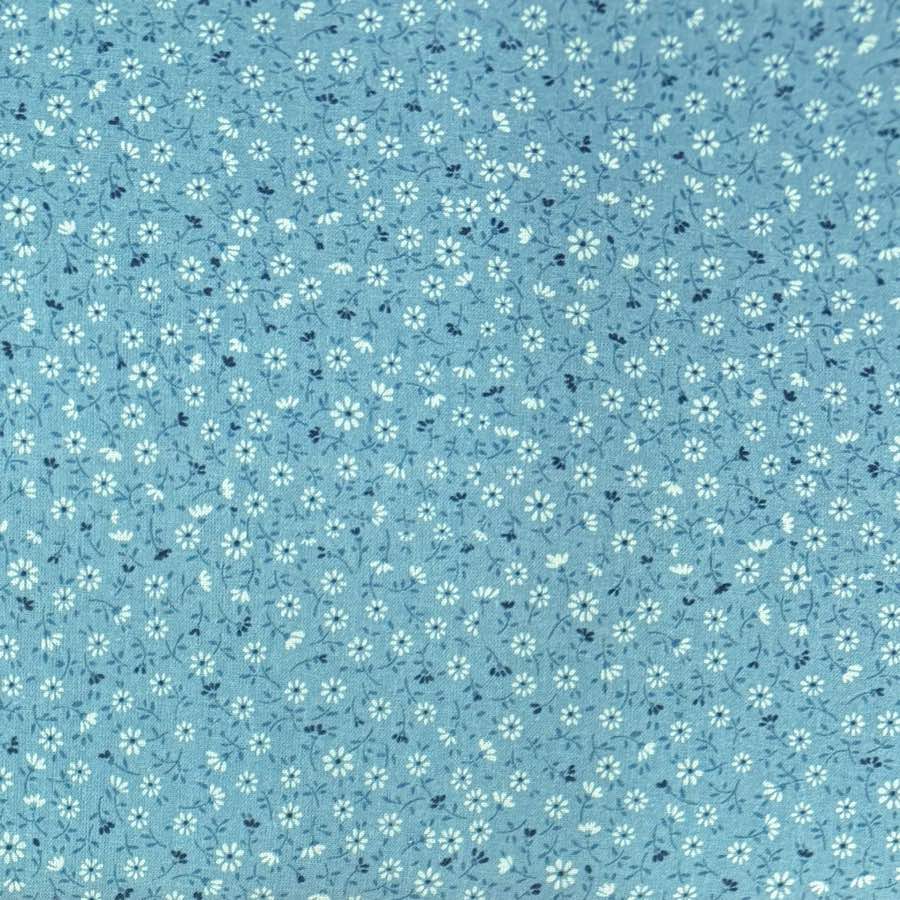 Flor Pequeña Celeste — Algodón estampado en El Baúl de Lore