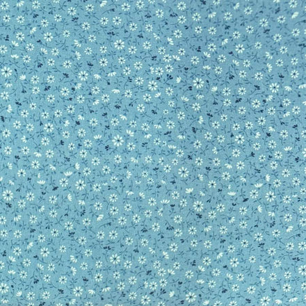 Flor Pequeña Celeste — Algodón estampado en El Baúl de Lore